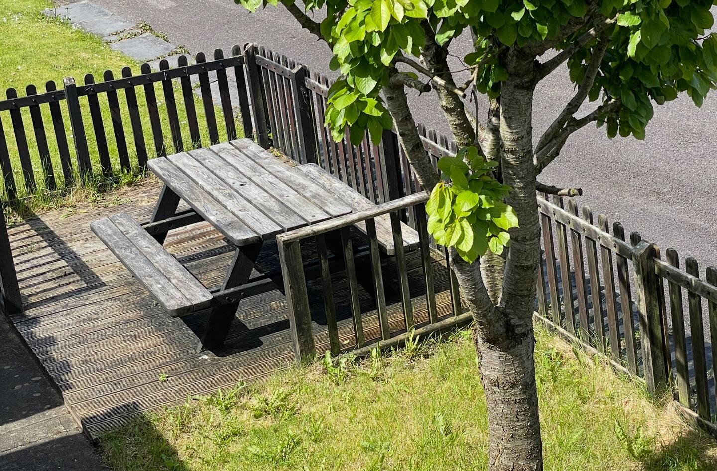 Dining beside the old station wall