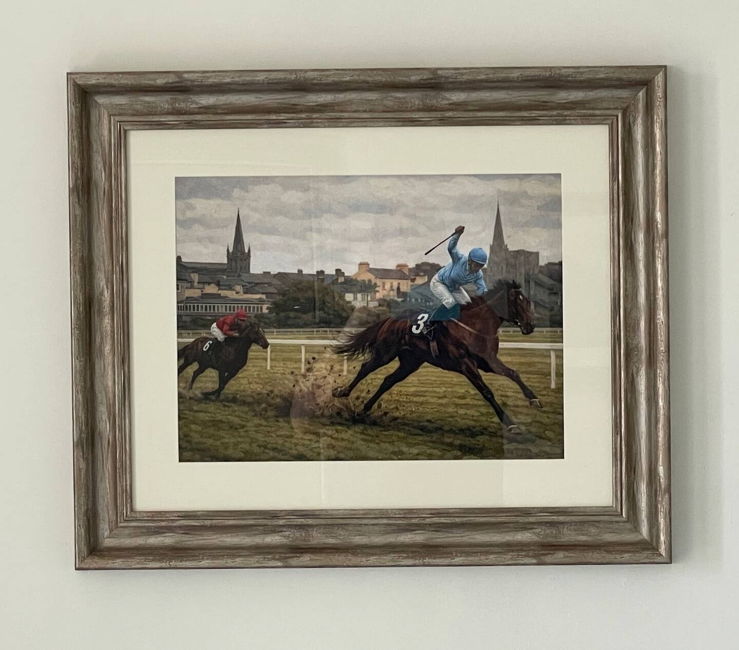 Artwork in bedroom one featuring The Listowel Races