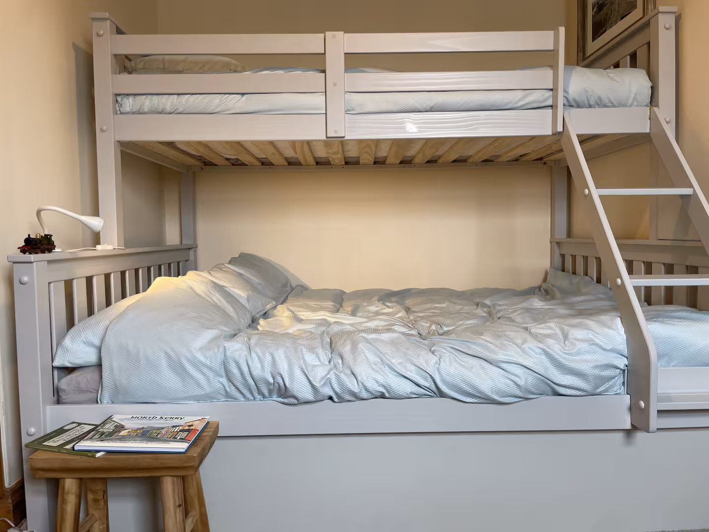 The main bed features a high-quality deep luxury double mattress suitable for adults